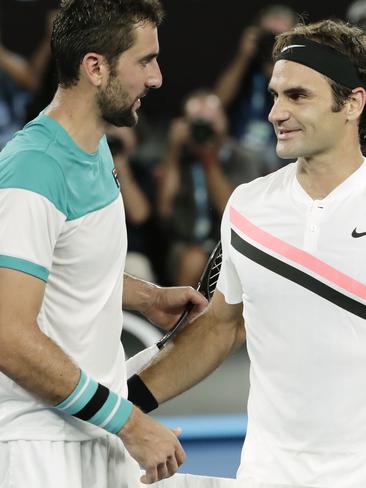 Marin Cilic congratulates Roger Federer after the Australian Open final. Picture: AAP