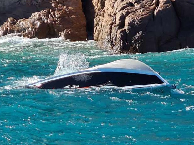 A capsized boat off Eshelby Island in the Whitsundays. Picture: VMR Whitsundays