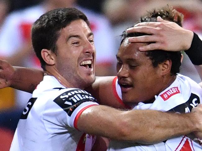 Luciano Leilua (right) of the Dragons celebrates scoring a try with Ben Hunt (left) during the Elimination Final between the Brisbane Broncos and the St George-Illawarra Dragons in Week 1 of the NRL Finals Series at Suncorp Stadium in Brisbane, Sunday, September 9, 2018. (AAP Image/Darren England) NO ARCHIVING, EDITORIAL USE ONLY