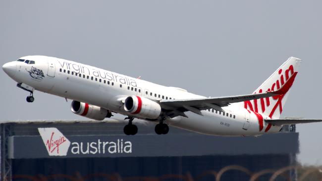 A Virgin Australia aircraft departing from Brisbane Airport. Pictures: David Clark Photography