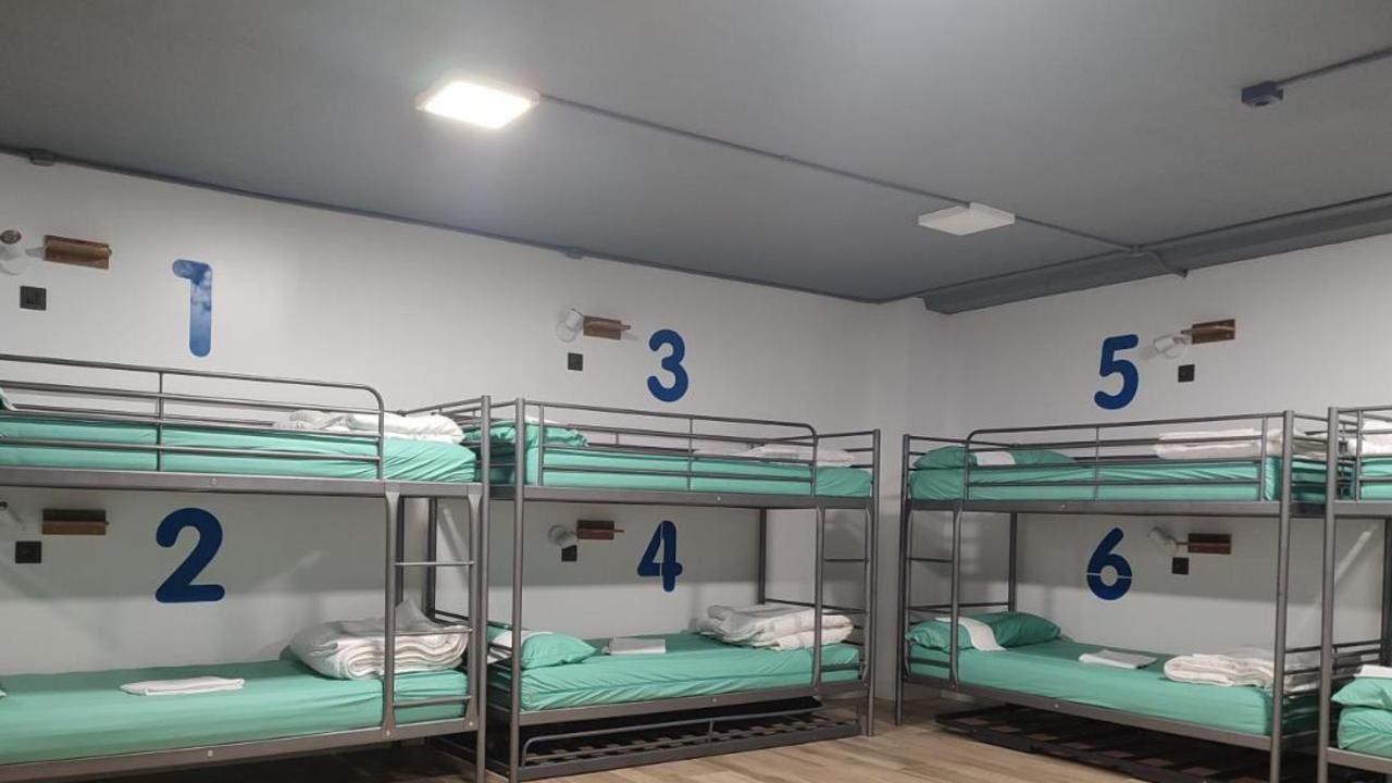 Football fans slam hostel’s wild price