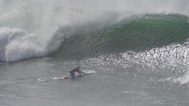 Gold Coast ocean athelete Phil Clayton paddles into a wave. Picture: Instagram/@photowilba