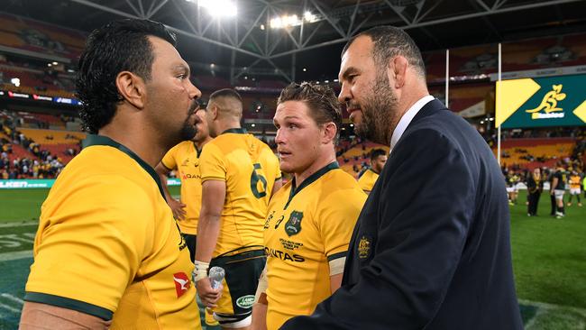 Kurtley Beale gets congratulated by Michael Cheika after the win. Picture: AAP.