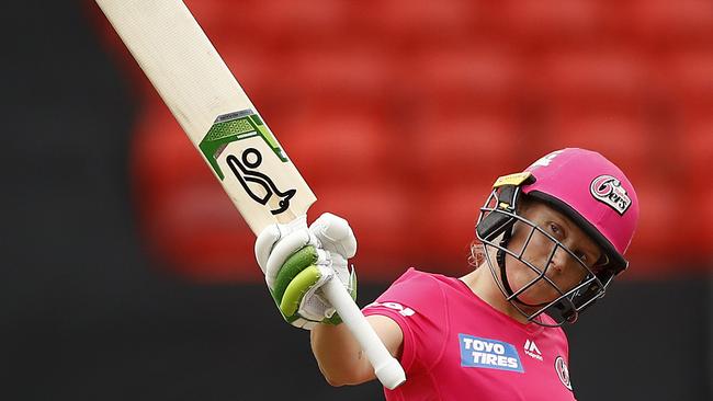 Alyssa Healy enjoys her half-century against the Renegades.