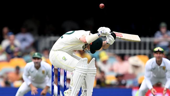 Travis Head ducks out of the way in the second innings. Picture: Bradley Kanaris/Getty