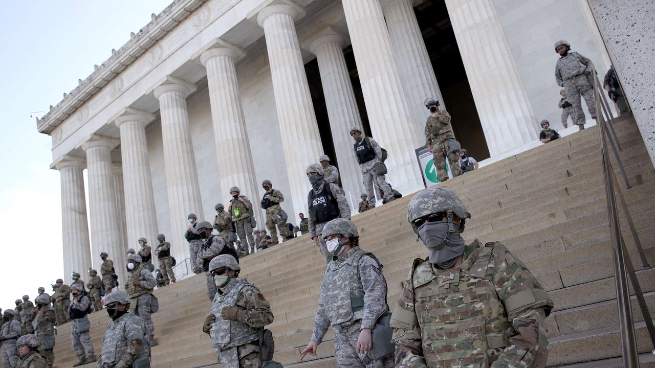 Members of the D.C. National Guard stand on the steps of the Lincoln Memorial as demonstrators participate in a peaceful protest against police brutality and the death of George Floyd. Picture: Win McNamee/Getty Images/AFP.