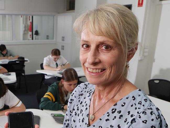 Principal Helen Jamieson with the YONDR phone locking pouch, Corinda State High School. Picture: Liam Kidston