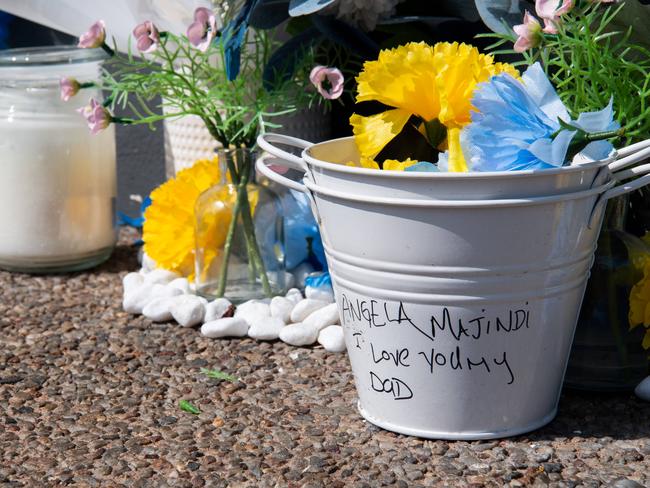 A memorial has been set up at the scene of a fatal stabbing of a 36-year-old Wadeye man outside the Cavenagh Street Woolworths supermarket on Saturday, September 16.Picture: Pema Tamang Pakhrin