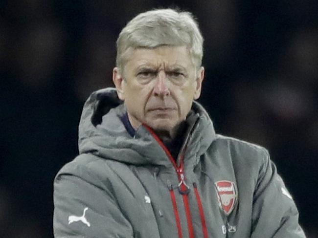 Arsenal's French manager Arsene Wenger watches during the English League Cup quarterfinal soccer match between Arsenal and Southampton at the Emirates stadium in London, Wednesday, Nov. 30, 2016. (AP Photo/Matt Dunham)