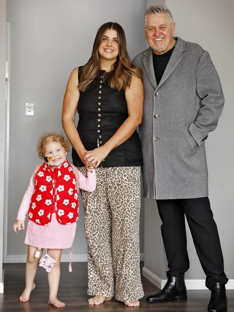 Lola with her mum Laura Clark and grandfather Ray Hadley. Picture: Sam Ruttyn