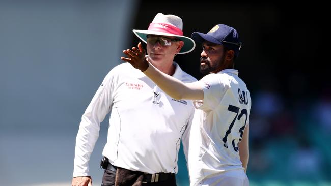 Mohammed Siraj stops play to make a formal complaint to Umpire Paul Reiffel about some spectators in the bay behind his fielding position during day four of the Third Test match. Picture: Getty Images