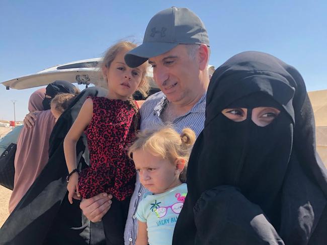 Kamalle Dabboussy with his daughter Mariam Dabboussy (right) and her daughters Aisha (left) and Fatema. They are reported to be on the flight to Australia. Picture: Supplied