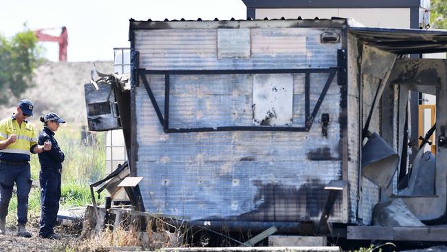 A crime scene has been established as police investigate a blaze that destroyed a commercial shed and started a grassfire at a concrete quarry in Meridan Plains. Picture: Patrick Woods.