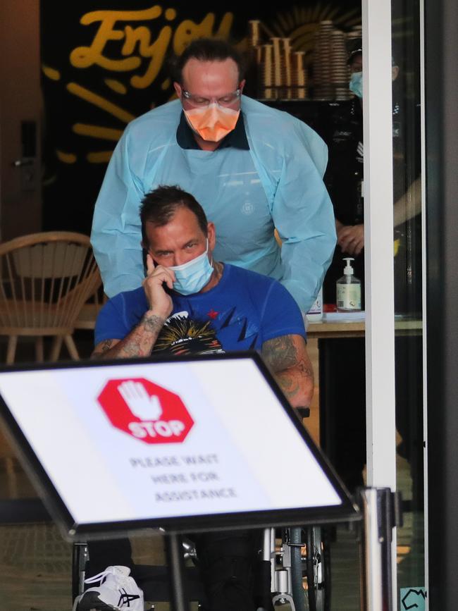 Shane Bowden is transferred from from the Voco Hotel at Surfers Paradise to Gold Coast University Hospital prior to his shooting death. Picture Glenn HampsonPicture Glenn Hampson