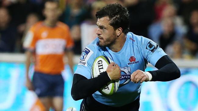 Adam Ashley-Cooper of the Waratahs scores a try.