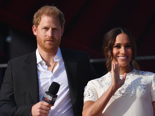 (FILES) In this file photo taken on September 25, 2021, Britain's Prince Harry and Meghan Markle, Duchess of Sussex, speak during the 2021 Global Citizen Live festival at the Great Lawn, Central Park in New York City. - Prince Harry will release his memoir in January, his publisher said Thursday, with the highly-anticipated account of life in the monarchy and after he quit royal duties landing just four months after the death of Queen Elizabeth II. (Photo by Angela Weiss / AFP)