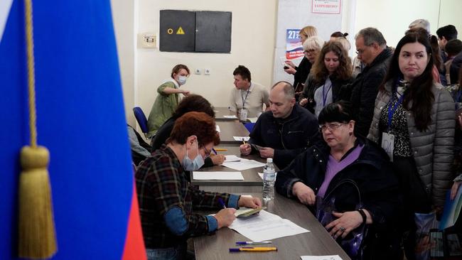 Refugees from Ukraine regions held by Russia arrive to vote for a referendum at a polling station in Rostov-on-Don. Picture: AFP