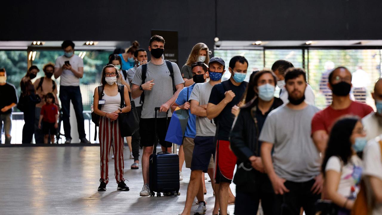 Members of the public queue to receive the Pfizer-BioNTech Covid-19 vaccine in the Turbine Hall at a temporary Covid-19 vaccine centre at the Tate Modern in central London on July 16, 2021. Picture: Tolga Akmen / AFP