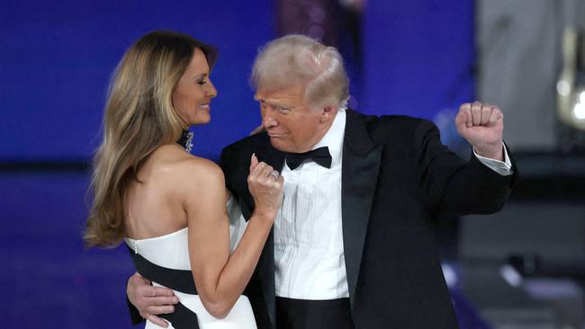 President Donald Trump dances with his wife First Lady Melania Trump at the Liberty Inaugural Ball in DC. (Photo by JOE RAEDLE / GETTY IMAGES NORTH AMERICA / Getty Images via AFP)