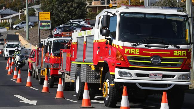 Tasmania Fire Service trucks lined up outside the church in Kingston. Picture: NIKKI DAVIS-JONES