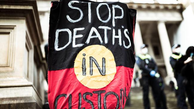 Protesters march in Bourke Street, Melbourne on Saturday. Picture: Getty Images