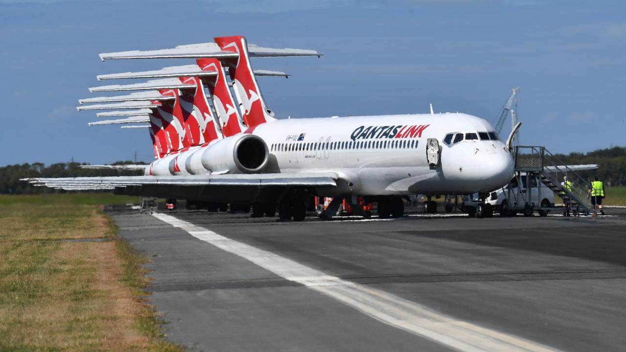 Grounded Qantas aircraft parked at Brisbane Airport. Picture: Darren England/AAP