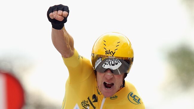 Bradley Wiggins of Great Britain and SKY Procycling punches the air with delight