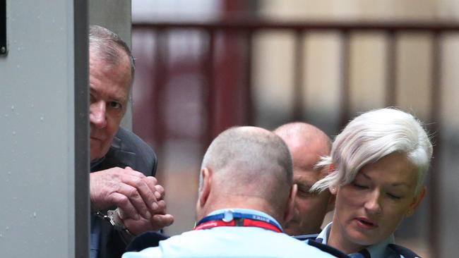 Gregory Keith Davies arrives in a prison van at the Melbourne Supreme Court in May, 2017.