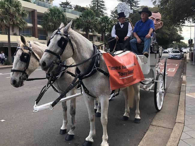 GetUp’s latest stunt involved a larger than life Tony Abbott riding a horse and cart. Picture: Ben James