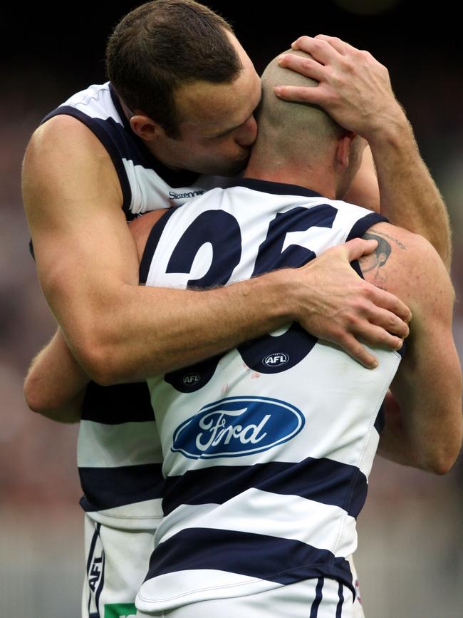 Brad Ottens and Paul Chapman celebrate a goal in the 2007 grand final.