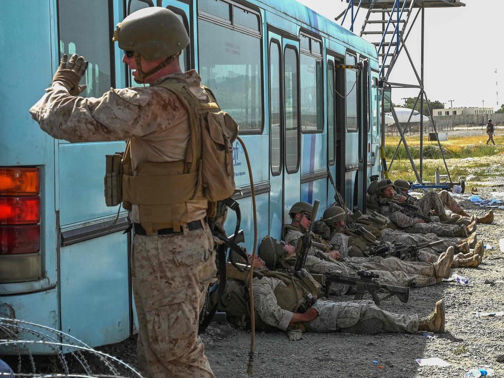 US soldiers rest at the airport. Picture: Wakil Kohsar/AFP