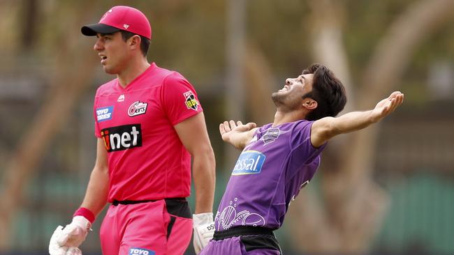 Qais Ahmand celebrates the wicket of Moises Henriques during the Big Bash League match between the Hobart Hurricanes and the Sydney Sixers at Traeger Park on December 20, 2019 in Alice Springs, Australia. (Photo by Darrian Traynor/Getty Images)