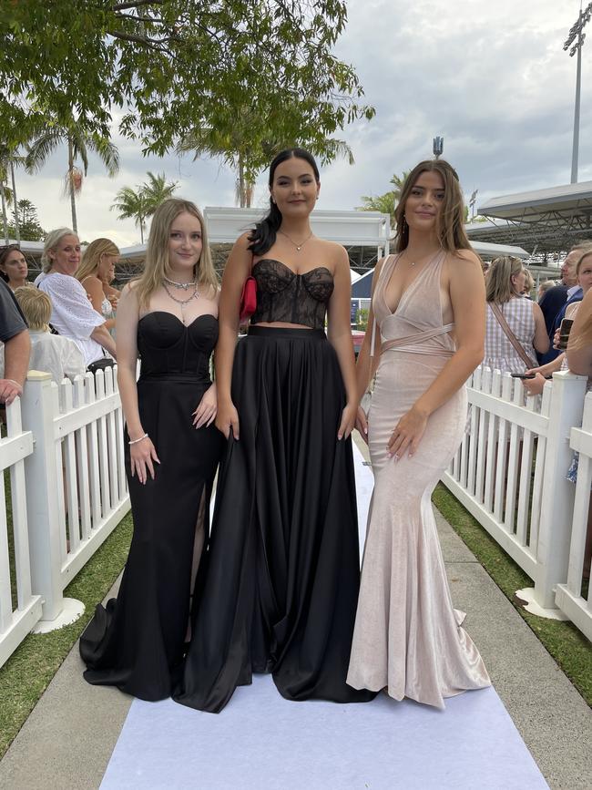 Olivia Holak, Ella Cobain, and Nelah Sisarich at the 2023 Unity College formal.