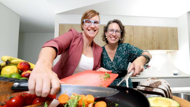 L to R, Professor Lauren Ball, Vice President of Dietitians Australia, with Dr Fiona Willer the President of Dietitians Australia, on saving money while eating healthy during cost of living crisis, cheap healthy food, Stones Corner - Photo Steve Pohlner, on Friday 21st February 2025 - Photo Steve Pohlner