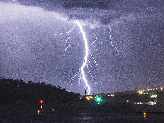 Lightning flashes appear to strike Mosman and the northern beaches.Photos:  Chris McKeen