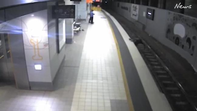 Drunken falls at train stations captured on Queensland Rail CCTV | news ...