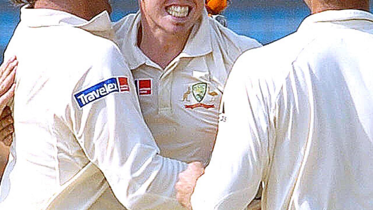 APRIL 16, 2006: Bowler Dan Cullen (C) celebrates the dismissal of batsman Mashrafee bin Mortaza (L) during the second Test match of Bangladesh v Australia series at Chittigong Stadium in Chittagong, 16/04/06.Cricket