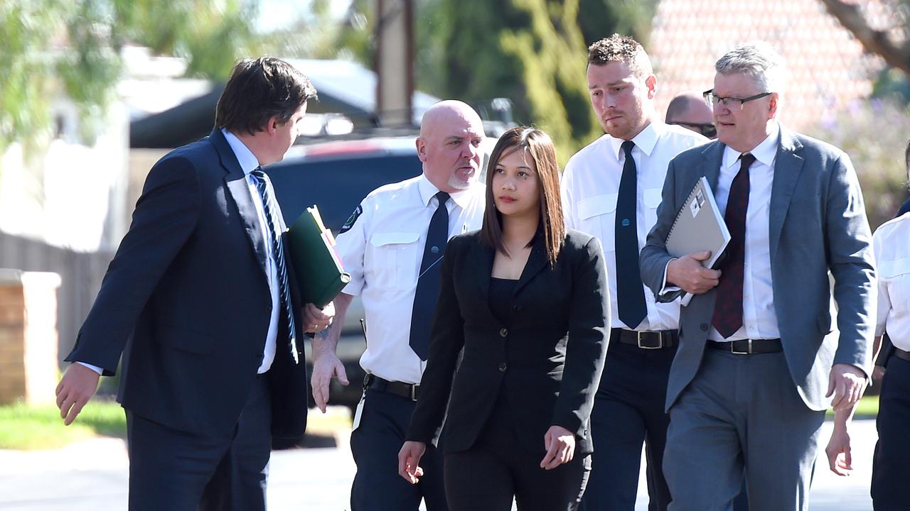 Caroline Dela Rose Nilsson accompanies her lawyers on a visit to the Valley View home where she is accused of murdering her mother-in-law, Myrna Nilsson. Picture: NCA NewsWire/Naomi Jellicoe