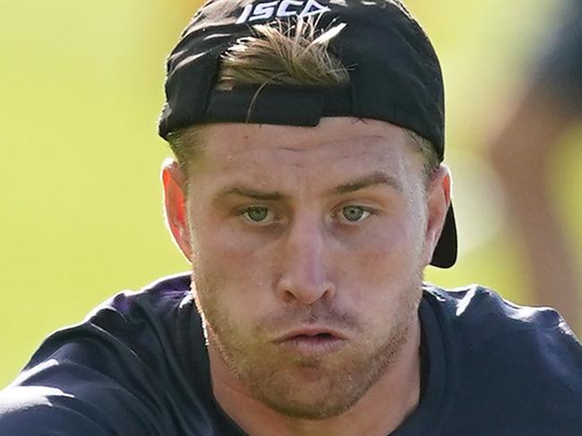 Cameron Munster runs with the ball during a Melbourne Storm NRL training session at Albury Sports Ground in Albury, Thursday, May 7, 2020. (AAP Image/Scott Barbour) NO ARCHIVING