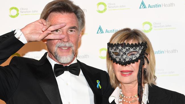 Olivia Newton-John (right) with her husband John Easterling at the Olivia Newton-John Cancer Wellness &amp; Research (ONJ) Centre Gala at the Crown Casino in Melbourne, Friday, September 8, 2017. (AAP Image/Tracey Nearmy)<br/>                        <br/>