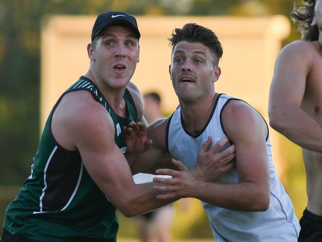 Tom Bell (left) jostles with Ben Fennell during pre-season at Greensborough. Picture: Nathan McNeill 