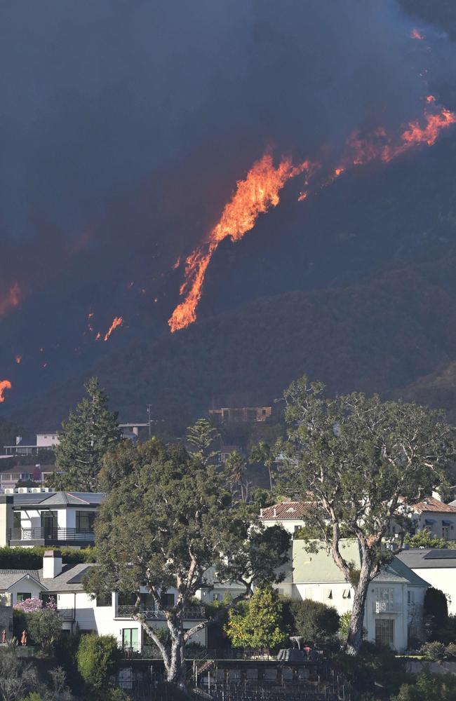 Flames from the Palisades Fire approach homes in Pacific Palisades, California. Picture: AFP