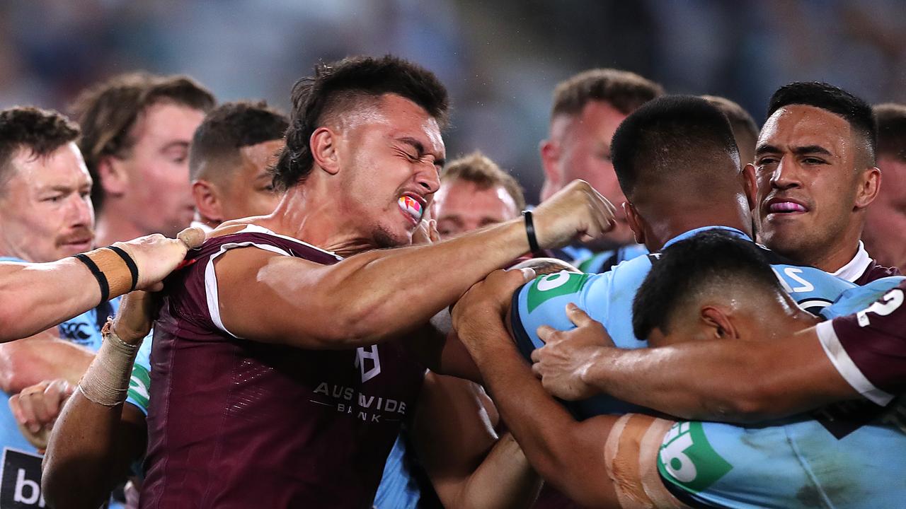 *APAC Sports Pictures of the Week – 2020, November 16* – SYDNEY, AUSTRALIA – NOVEMBER 11: Tino Fa'asuamaleaui of the Maroons and Payne Haas of the Blues scuffle during game two of the 2020 State of Origin series between the New South Wales Blues and the Queensland Maroons at ANZ Stadium on November 11, 2020 in Sydney, Australia. (Photo by Mark Kolbe/Getty Images)