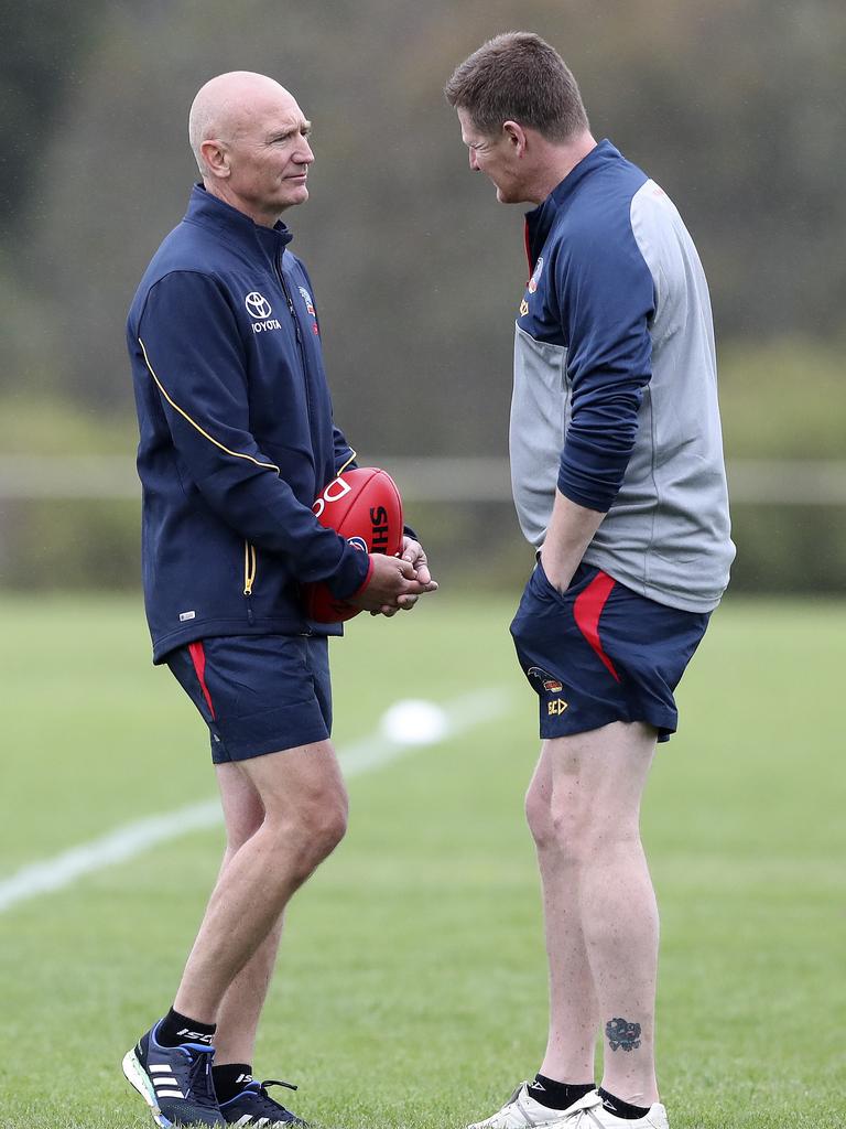 Adelaide Crows coaching staff Steve Saunders, left, and Ben Hart talk during a pre-season training session last month. Picture: Sarah Reed