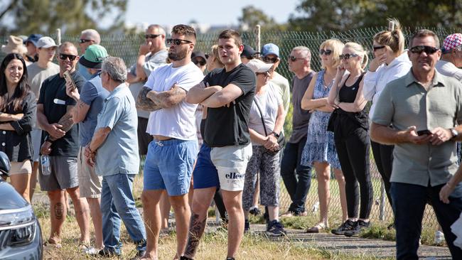 Crowds gather for an auction in Sydney, the most expensive city in Australia. Picture: Julian Andrews