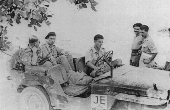 Rhodes scholar Tom Dunbabin (second left) with Allied soldiers, became an unlikely hero of the Crete resistance in World War II.