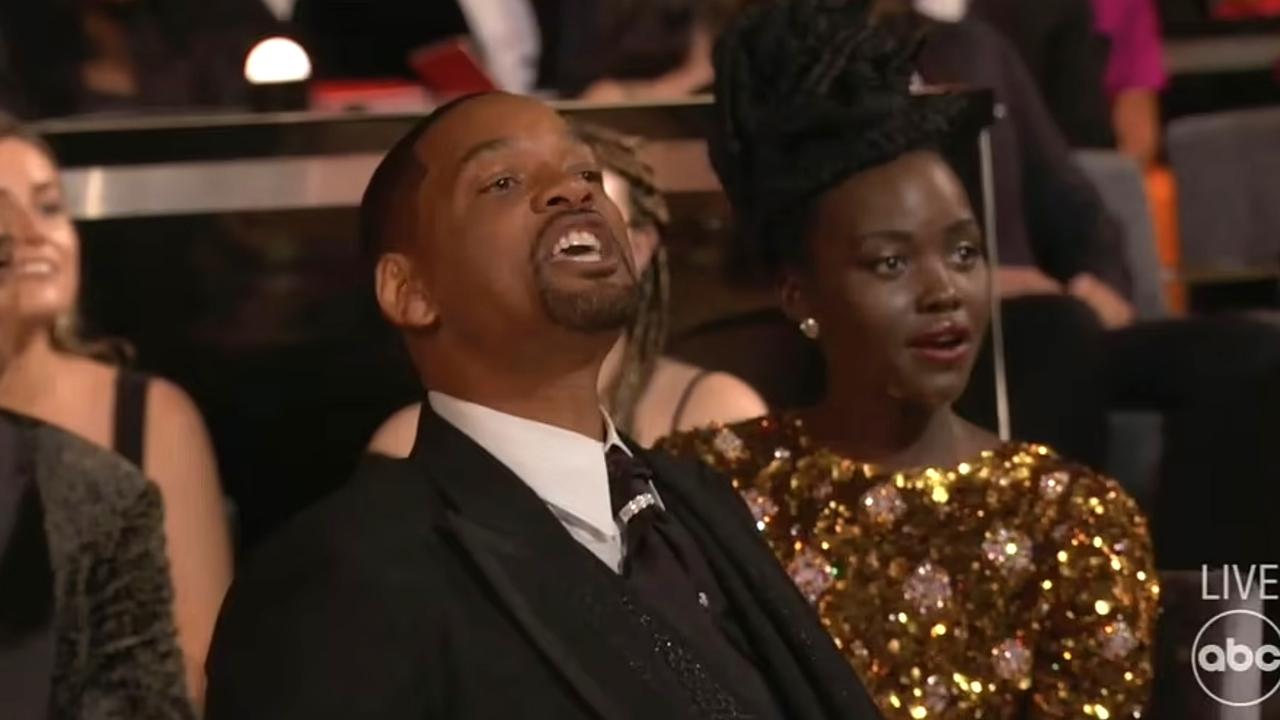 A visibly emotional Will Smith walked back to his seat and shouted: ‘Keep my wife’s name out of your f***ing mouth’ to Chris Rock after slapping him. Picture: ABC