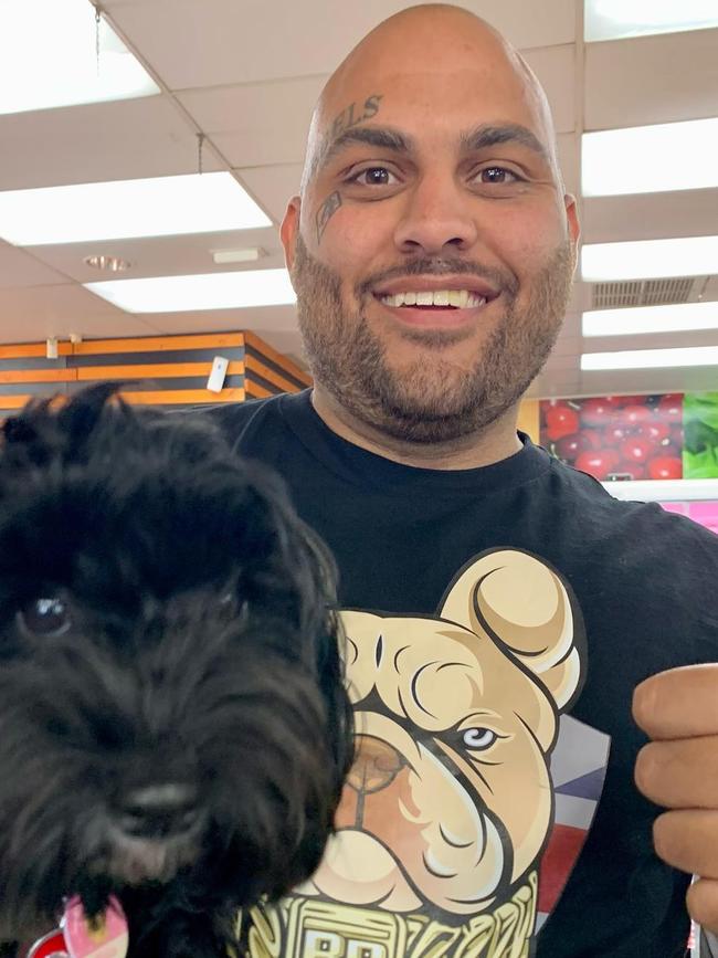 Bradley Daniele with Arlo the Cancer support dog. Picture: @arlo_the_cancer_service_dog/Instagram