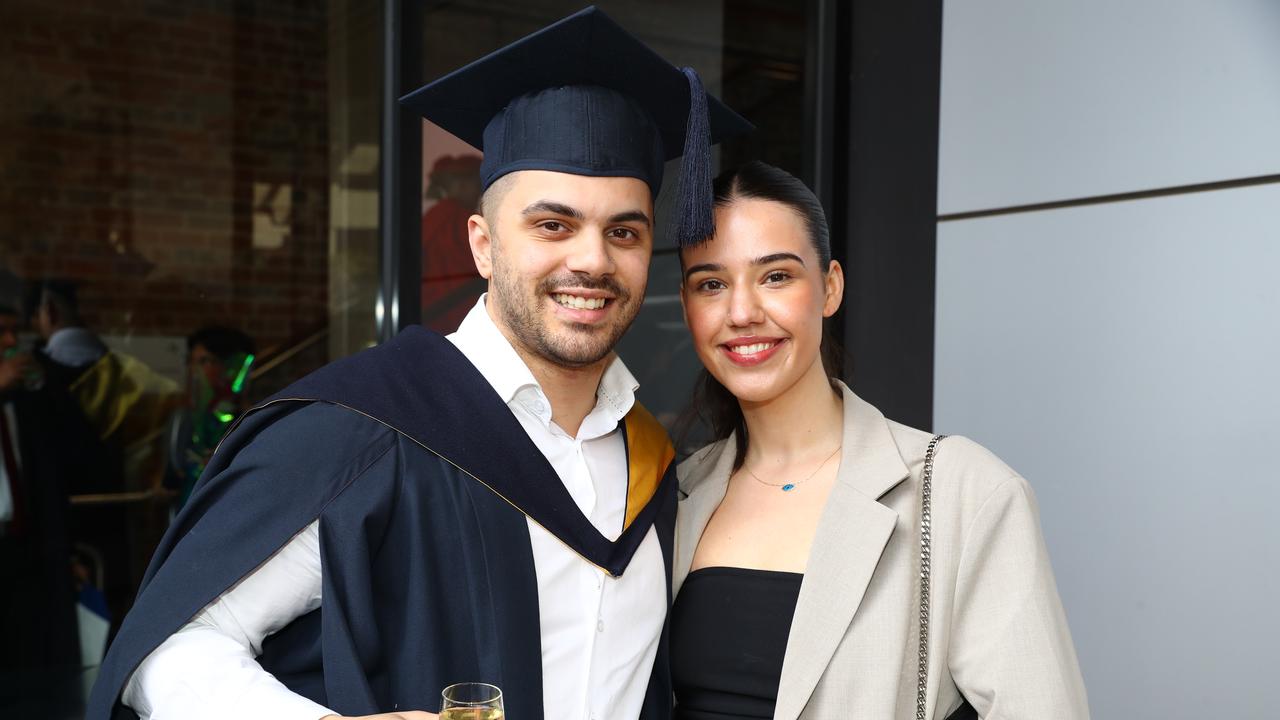 Deakin University graduate Evan Vlassis and girl friend Naia Michalopoulos. Picture: Alison Wynd