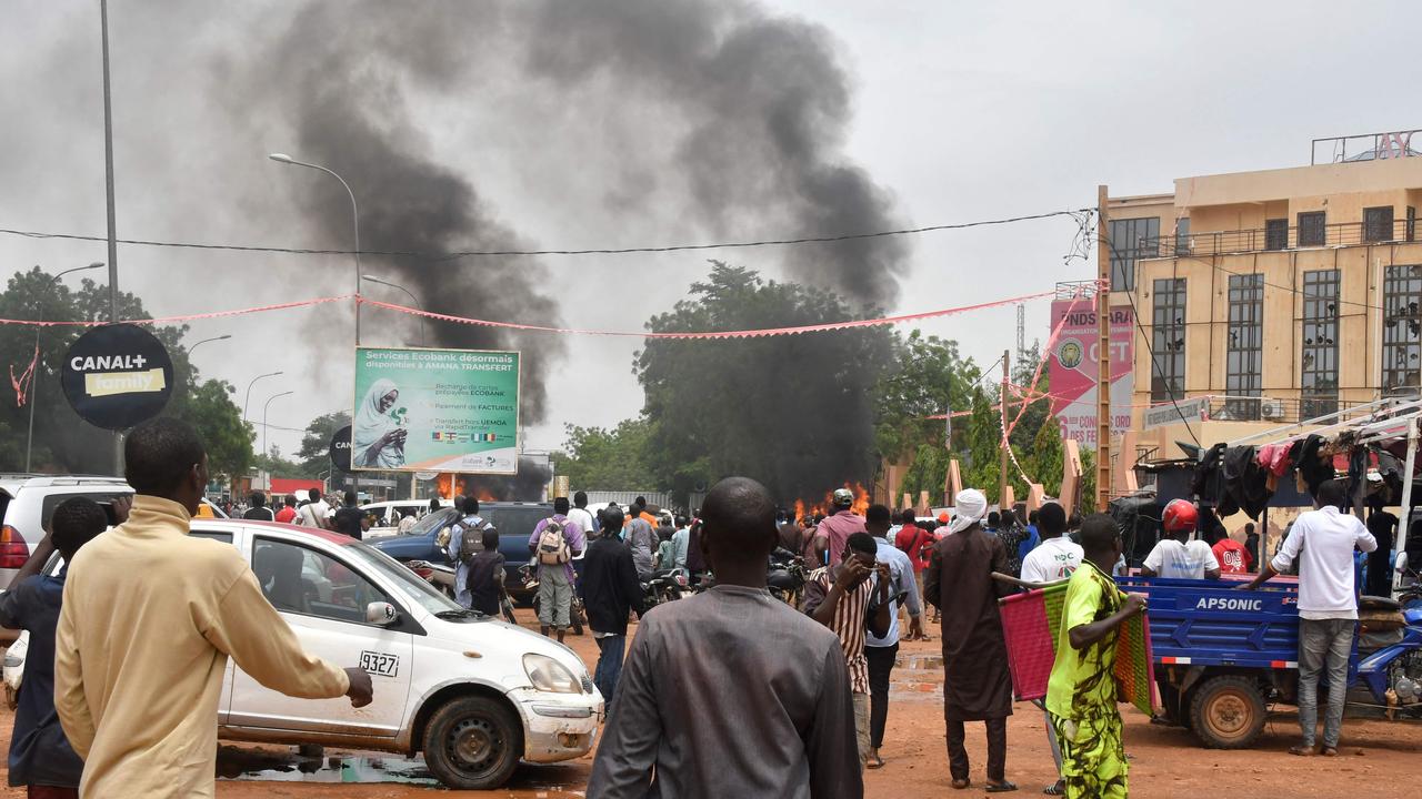 A general view of billowing smoke as supporters of defence and security forces attack the headquarters of the Nigerien Party for Democracy and Socialism, the party of overthrown President Mohamed Bazoum. Picture: AFP